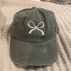 Olive Green Cap with White Bow Embroidery. Brand new and bought in a boutique.